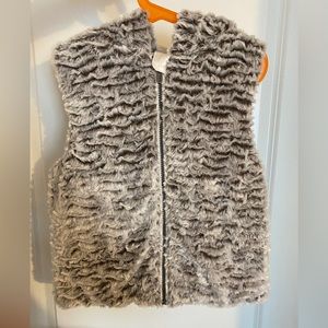 Kids faux fur vest with a hoodie from Switzerland